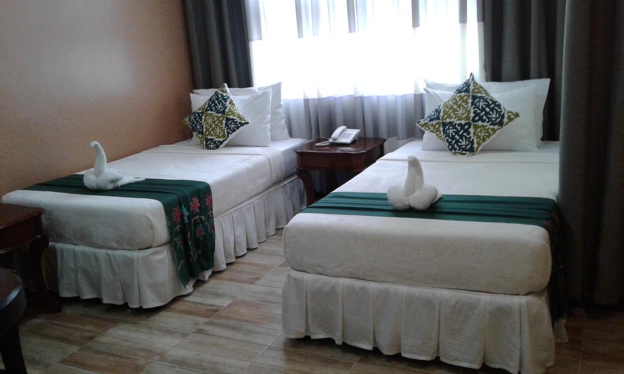 ชารอส ดอร์มิเทล Hotel Dumaguete City ภายนอก รูปภาพ