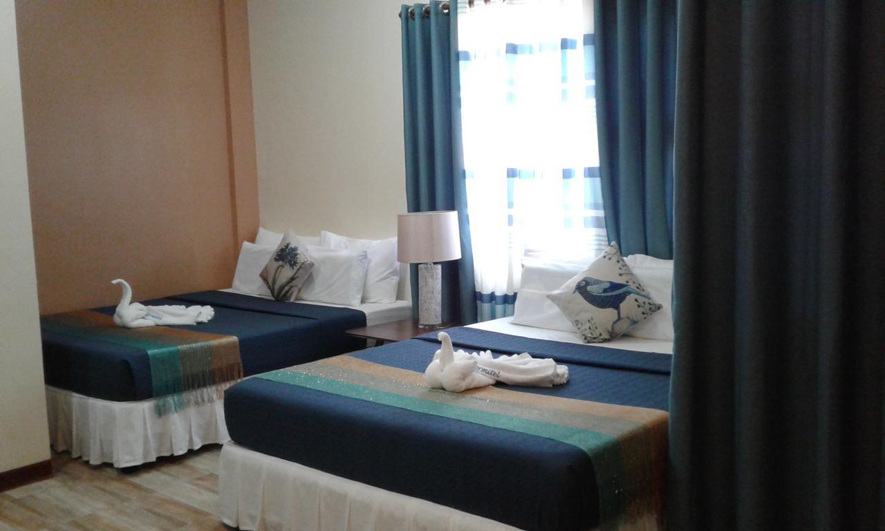 ชารอส ดอร์มิเทล Hotel Dumaguete City ภายนอก รูปภาพ