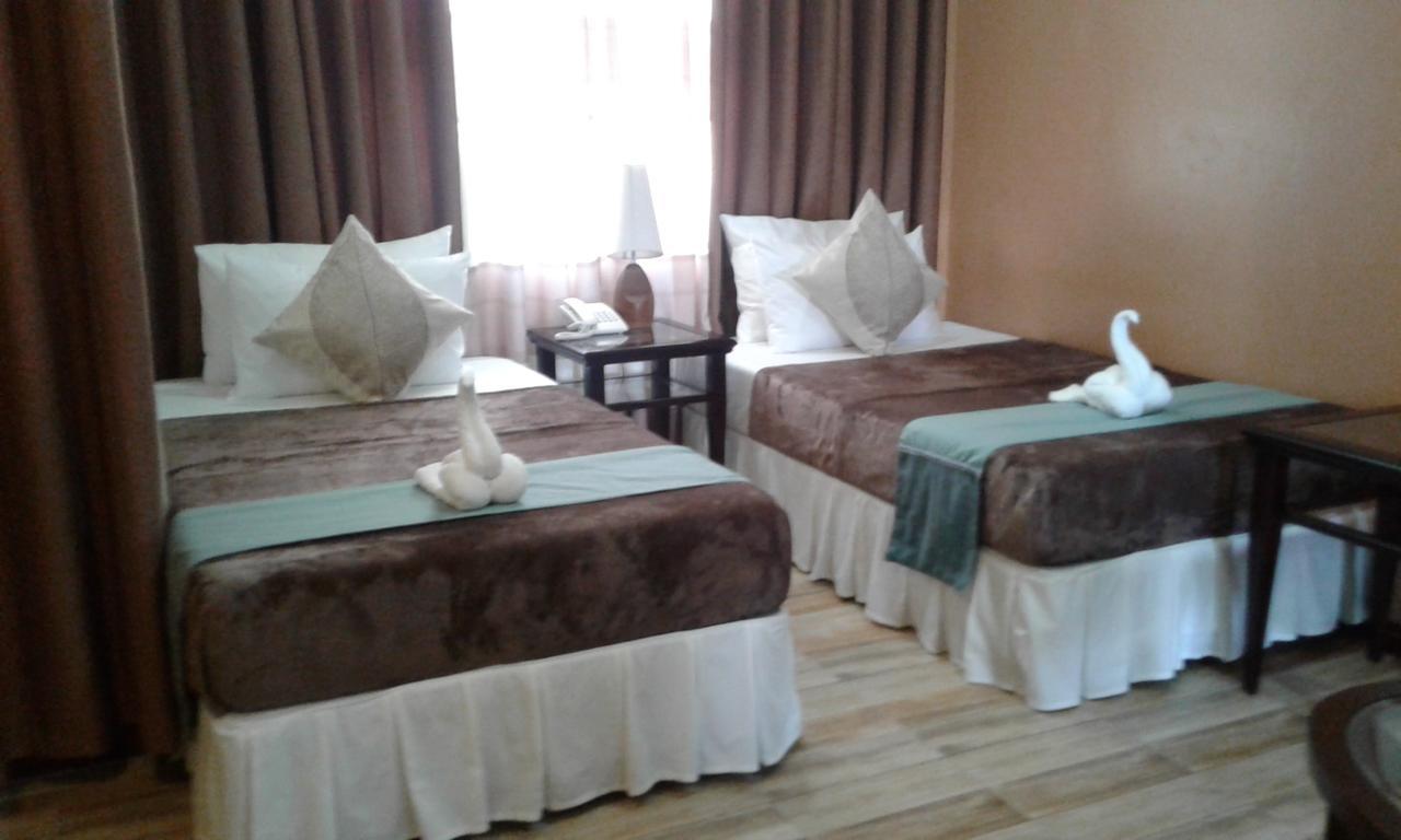 ชารอส ดอร์มิเทล Hotel Dumaguete City ภายนอก รูปภาพ