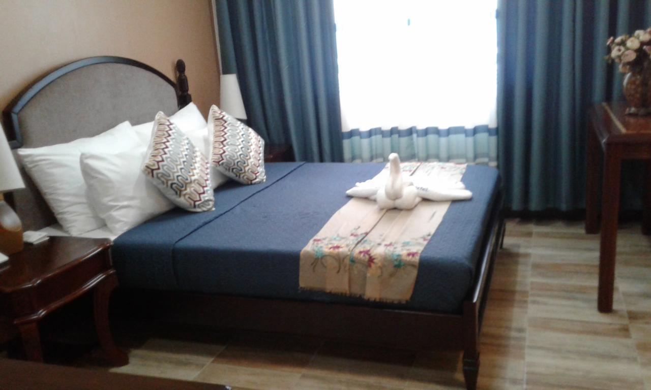 ชารอส ดอร์มิเทล Hotel Dumaguete City ภายนอก รูปภาพ