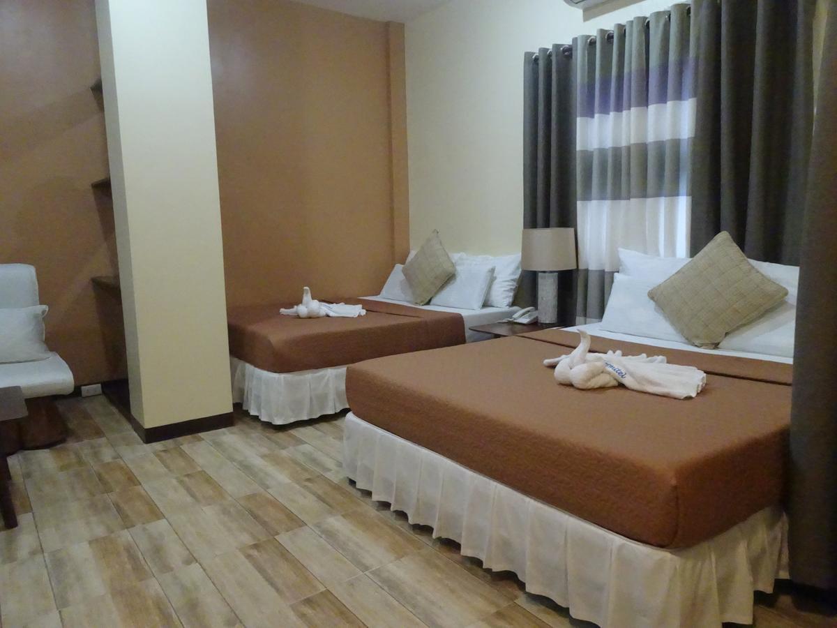 ชารอส ดอร์มิเทล Hotel Dumaguete City ภายนอก รูปภาพ