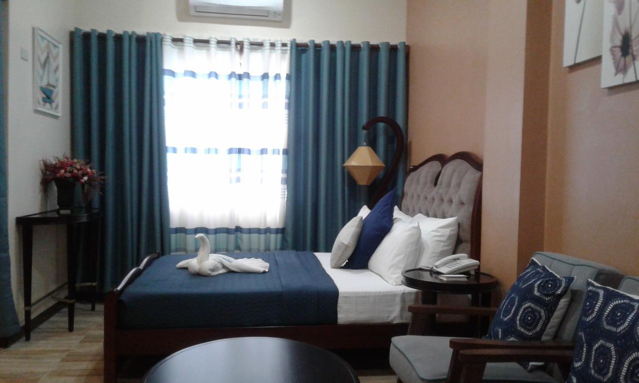 ชารอส ดอร์มิเทล Hotel Dumaguete City ภายนอก รูปภาพ