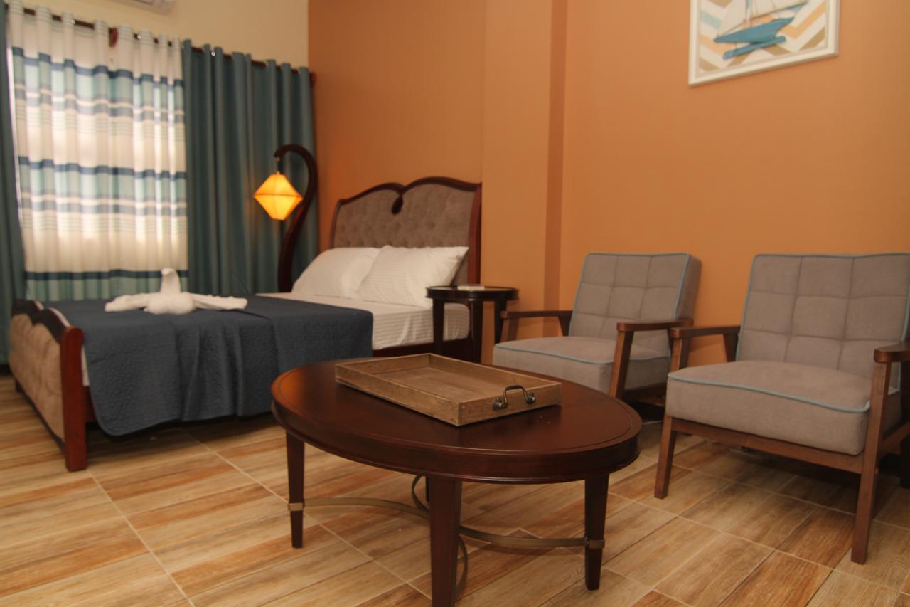 ชารอส ดอร์มิเทล Hotel Dumaguete City ภายนอก รูปภาพ